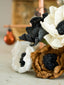 Dual-colored vintage-inspired crepe paper flowers. Handmade Christmas and seasonal ornaments in beige, black, brown, and white