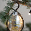 Glass Bauble with Tinsel and Handpainted Decorations