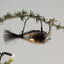 Silvered Glass Bird with Tinsel Decorations